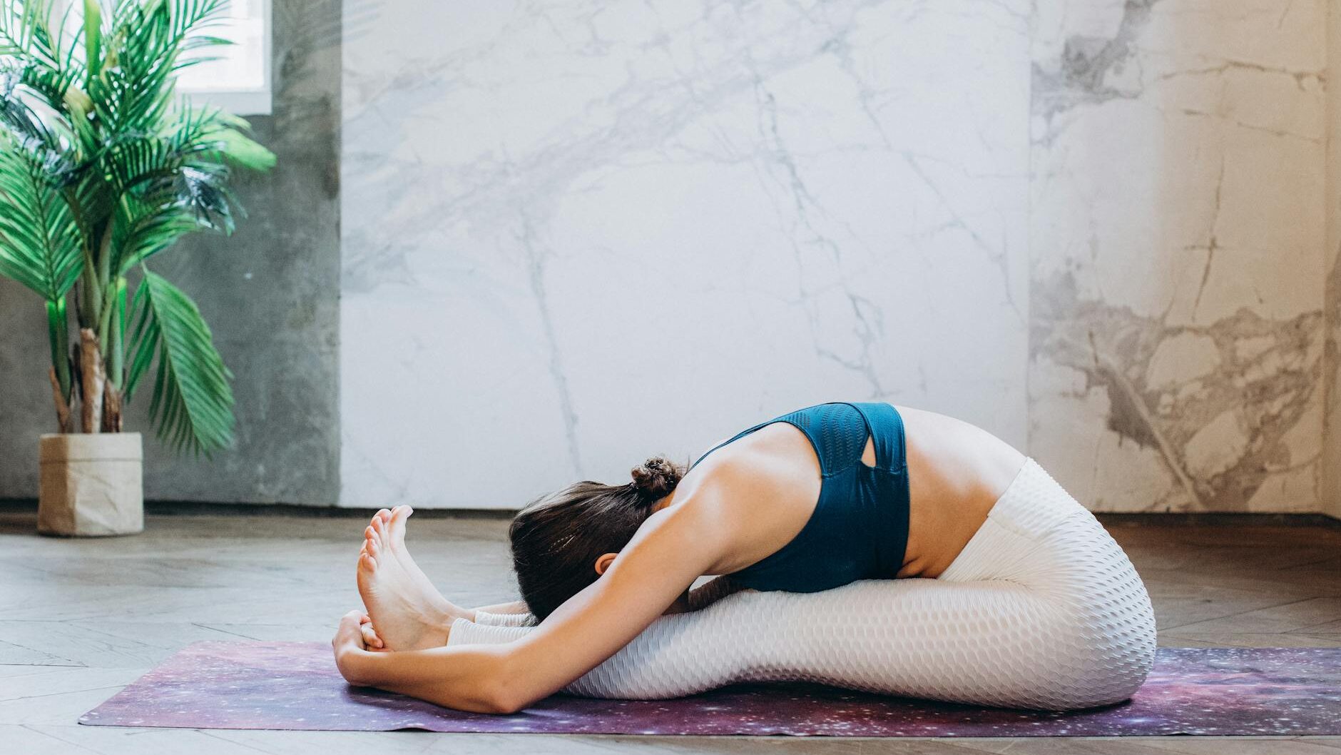 woman practicing yoga